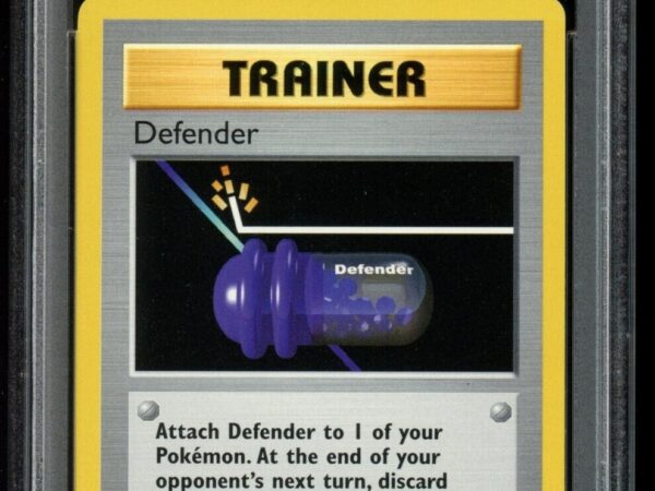 PSA 9 Defender 80/102 1st Edition Shadowless GREY STAMP!